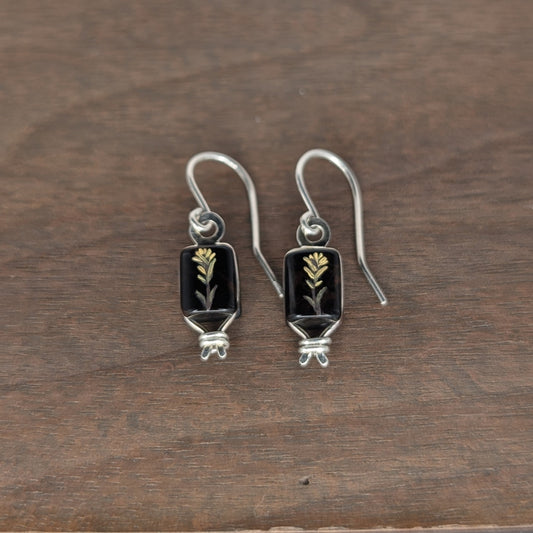 Pair of silver earrings with hand oil painted image of yellow flower on utah obsidian
